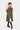 Military green twill trench coat with officially licensed Joy Division Love Will Tear Us Apart reference, genderless film-noir silhouette
